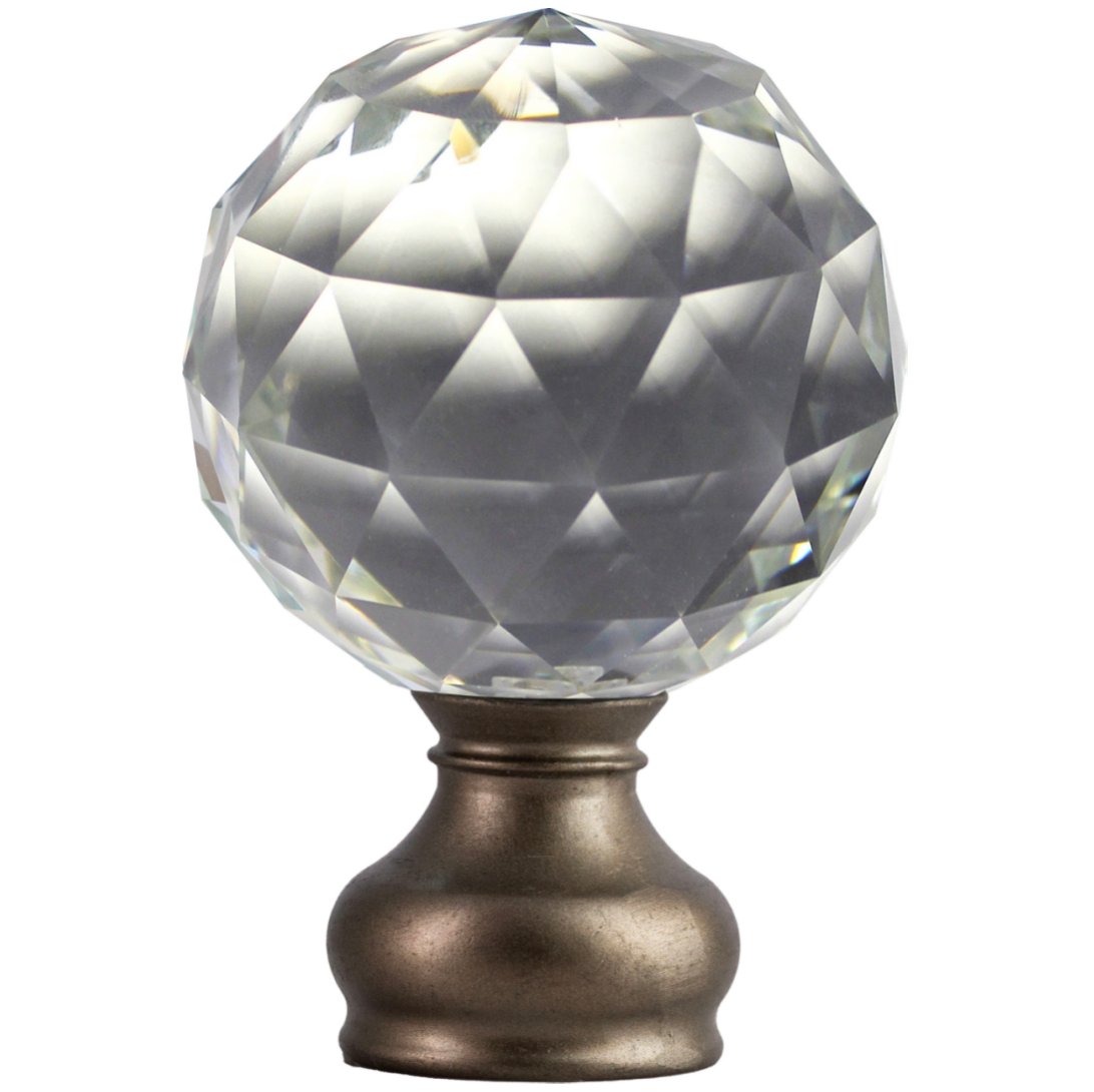 Finials are decorative caps at the ends of curtain rods. They help keep curtains in place and add style to the window.